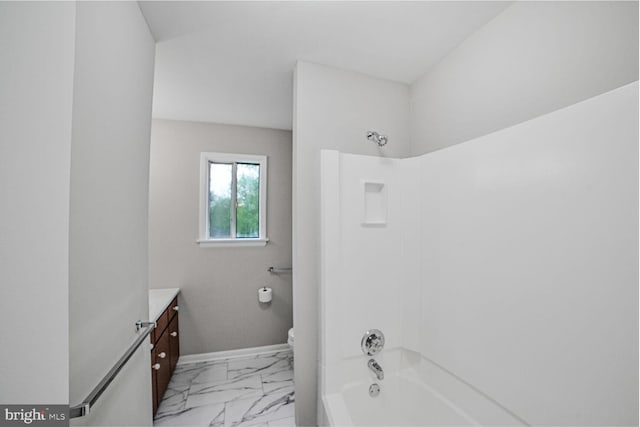 8012 Exodus Dr, Gaithersburg, MD 20882 - full bathroom featuring marble finish flooring, toilet, vanity, shower / washtub combination, and baseboards