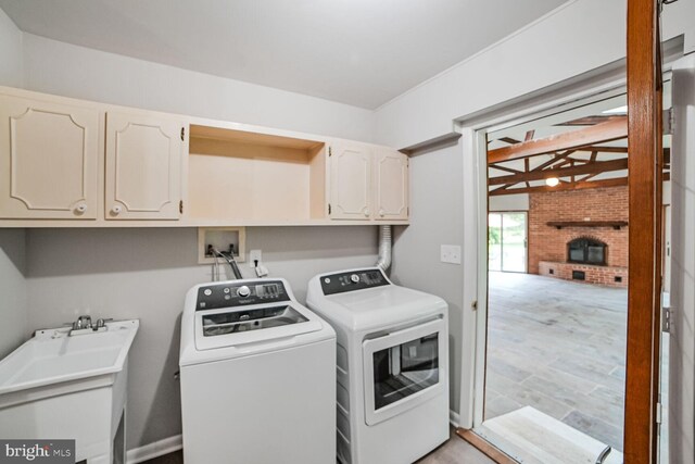 8012 Exodus Dr, Gaithersburg, MD 20882 - washroom with cabinet space and washer and clothes dryer