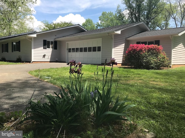 8012 Exodus Dr, Gaithersburg, MD 20882 - single story home featuring a garage, driveway, and a front lawn