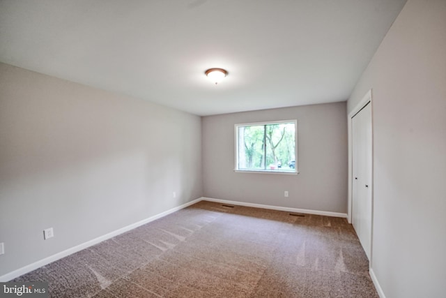 8012 Exodus Dr, Gaithersburg, MD 20882 - unfurnished bedroom featuring baseboards, carpet flooring, and a closet