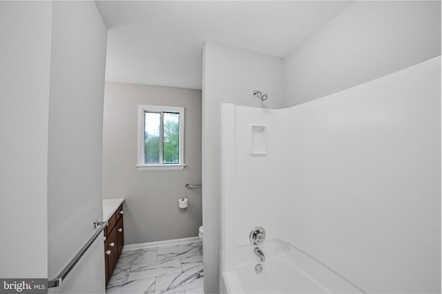 8012 Exodus Dr, Gaithersburg, MD 20882 - bathroom with marble finish flooring, toilet, vanity, shower / bath combination, and baseboards