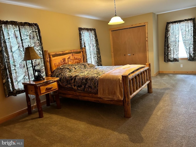 385 Elk Crk, Aaronsburg, PA 16820 - carpeted bedroom featuring a closet and baseboards