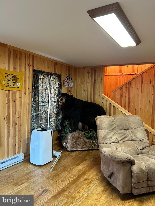 385 Elk Crk, Aaronsburg, PA 16820 - sitting room featuring wood walls and wood finished floors