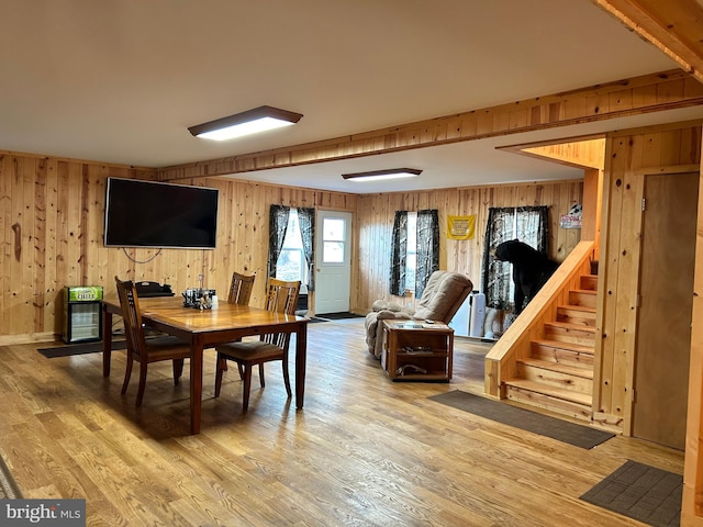 385 Elk Crk, Aaronsburg, PA 16820 - dining space featuring wood finished floors, stairway, and wood walls