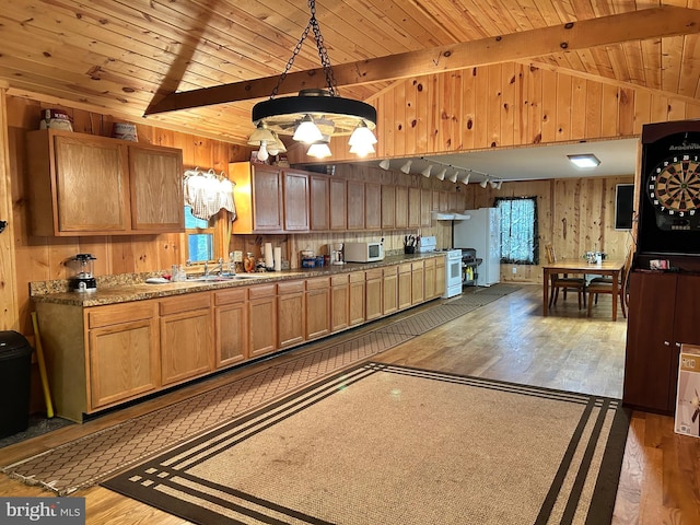 385 Elk Crk, Aaronsburg, PA 16820 - kitchen with white appliances, vaulted ceiling with beams, wood finished floors, and wood walls