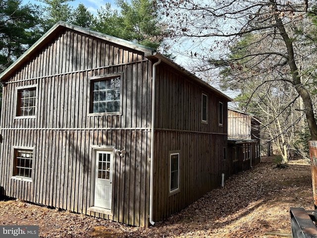 385 Elk Crk, Aaronsburg, PA 16820 - view of home's exterior featuring board and batten siding
