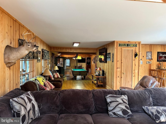 385 Elk Crk, Aaronsburg, PA 16820 - living room with billiards, wood finished floors, and wood walls