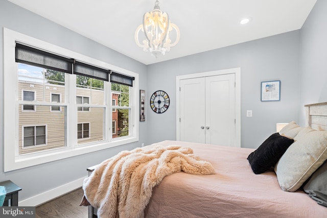 205 16th St SE, Washington, DC 20003 - bedroom with a chandelier, wood finished floors, a closet, and recessed lighting