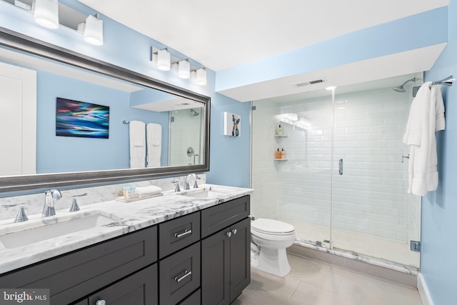 205 16th St SE, Washington, DC 20003 - bathroom featuring a stall shower, double vanity, and tile patterned flooring