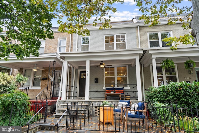 205 16th St SE, Washington, DC 20003 - townhome / multi-family property featuring brick siding, a porch, and ceiling fan