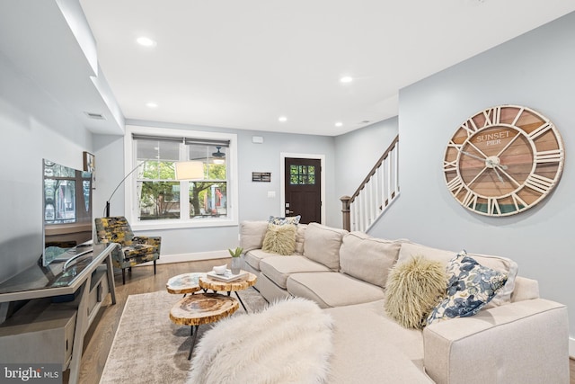 205 16th St SE, Washington, DC 20003 - living area with wood finished floors, stairway, recessed lighting, and plenty of natural light