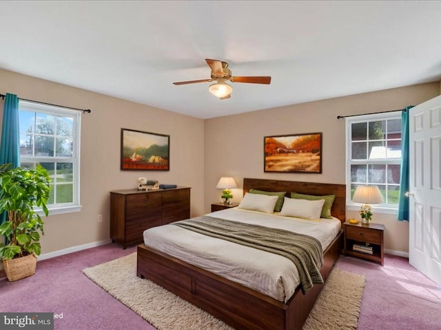 bedroom featuring carpet floors, baseboards, and ceiling fan