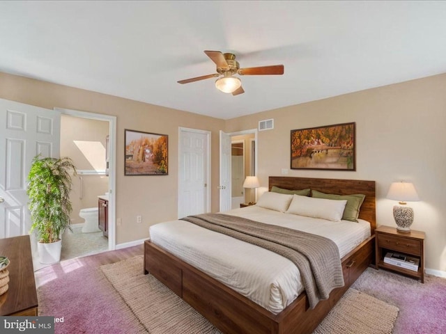 bedroom with connected bathroom, ceiling fan, light colored carpet, baseboards, and visible vents