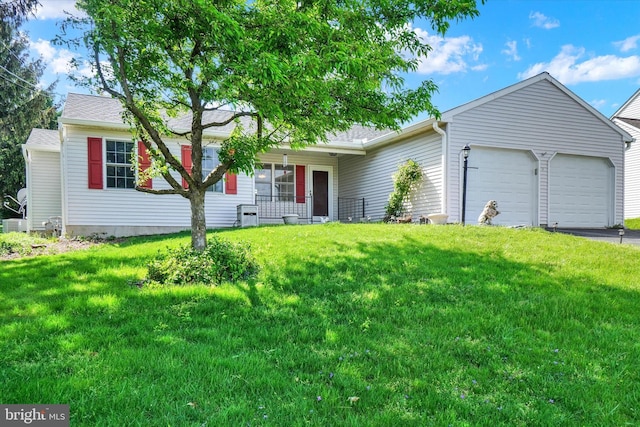 single story home with a porch, an attached garage, driveway, and a front yard