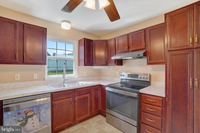 kitchen featuring ceiling fan, a sink, light countertops, under cabinet range hood, and stainless steel appliances