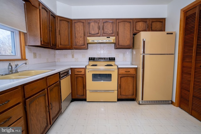 216 Shaw St Unit A10, Frostburg, MD 21532 - kitchen with under cabinet range hood, light floors, light countertops, white appliances, and a sink