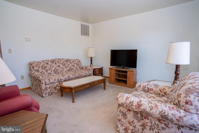 216 Shaw St Unit A10, Frostburg, MD 21532 - living area with baseboards, visible vents, and light carpet
