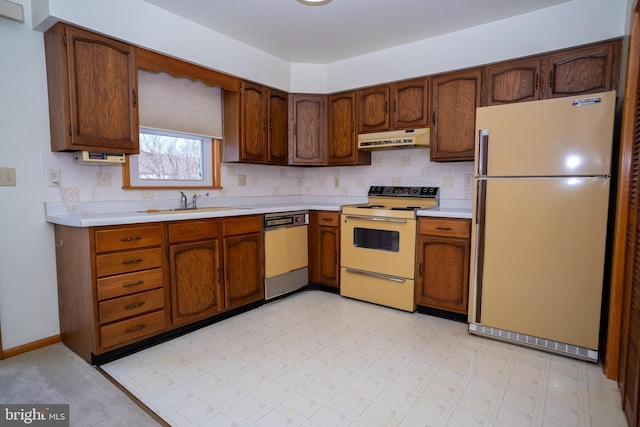 216 Shaw St Unit A10, Frostburg, MD 21532 - kitchen with under cabinet range hood, backsplash, white appliances, light countertops, and light floors