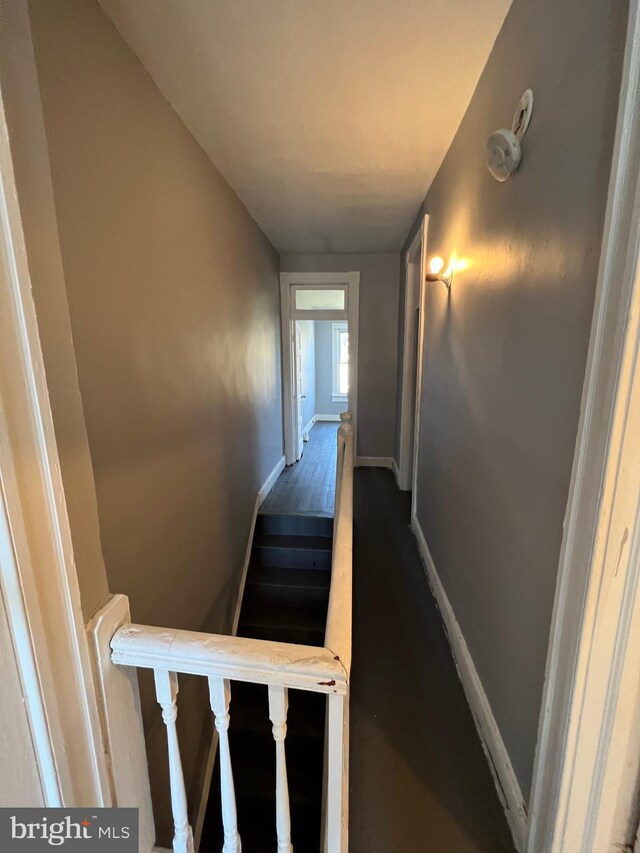 211 S Hilton St, Baltimore, MD 21229 - stairway with wood finished floors and baseboards