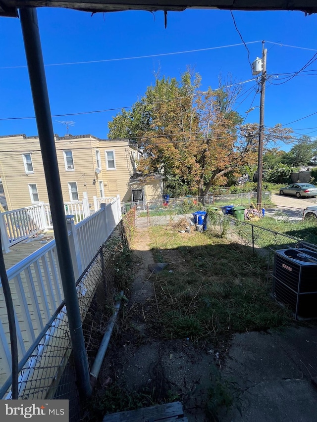 211 S Hilton St, Baltimore, MD 21229 - view of yard with cooling unit and a fenced backyard
