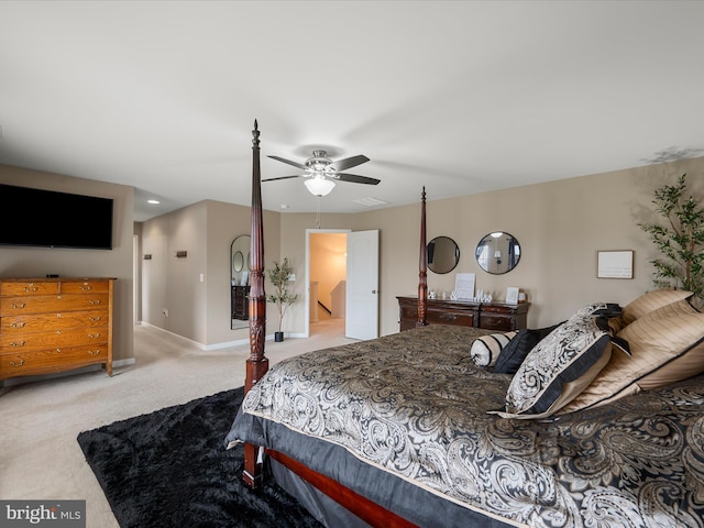 bedroom with carpet flooring, baseboards, and ceiling fan