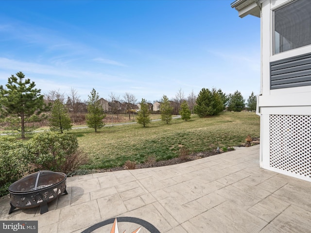 view of patio featuring a fire pit