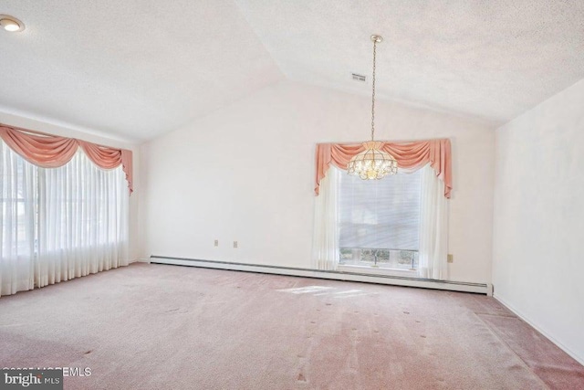 carpeted empty room with lofted ceiling, a baseboard heating unit, a textured ceiling, visible vents, and a notable chandelier