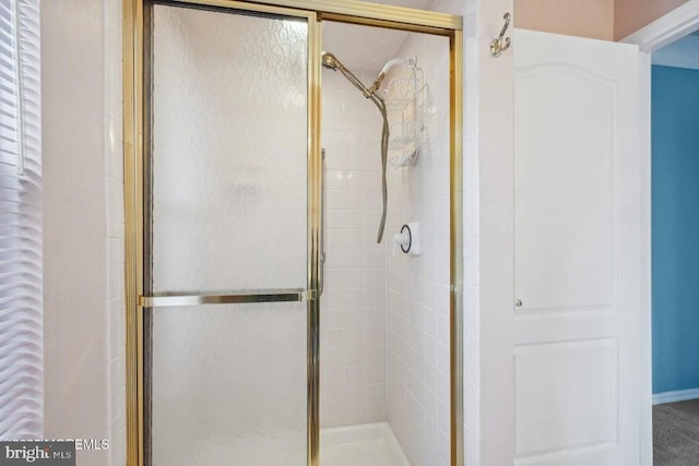 bathroom featuring a stall shower