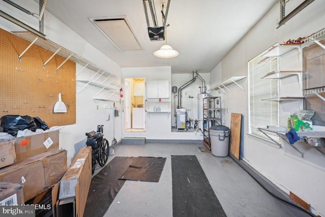 garage featuring gas water heater and a garage door opener