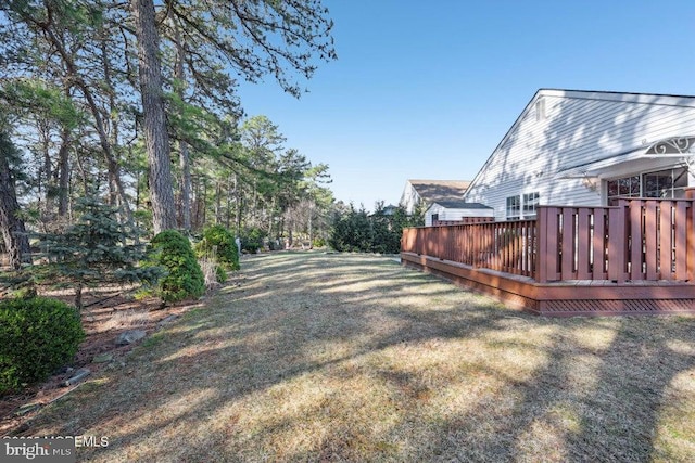 view of yard with a deck