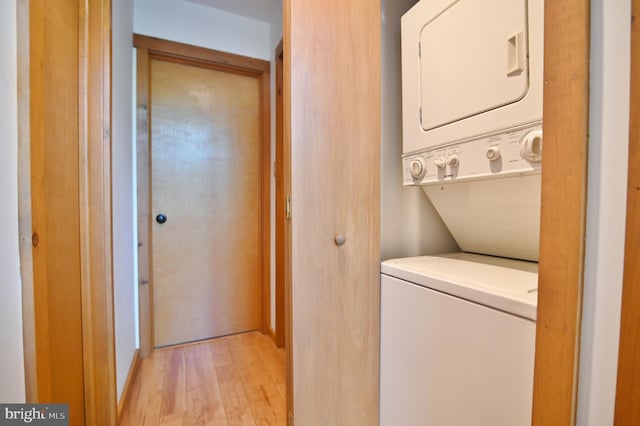 277 Anderson Rd, Basye, VA 22810 - laundry area featuring stacked washing machine and dryer and light wood-type flooring