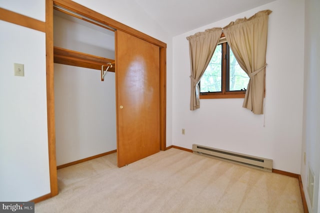 277 Anderson Rd, Basye, VA 22810 - unfurnished bedroom featuring baseboard heating, a closet, carpet, baseboards, and lofted ceiling