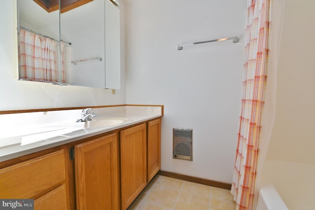 277 Anderson Rd, Basye, VA 22810 - full bath with vanity, tile patterned flooring, heating unit, shower / tub combo, and baseboards