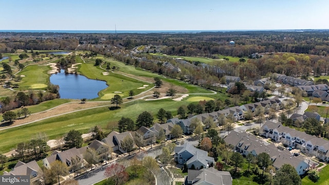 birds eye view of property with a water view, a residential view, and golf course view