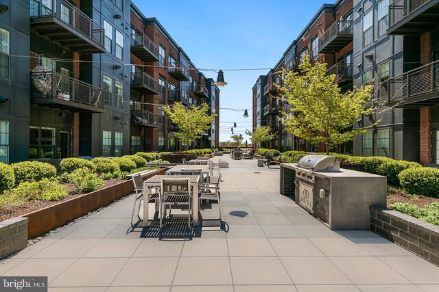 view of home's community with a patio