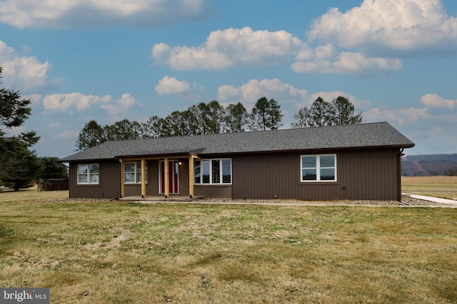 ranch-style house with a front lawn