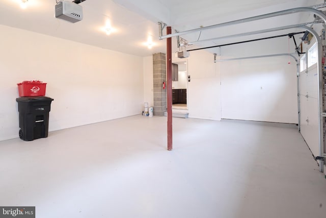 garage featuring a garage door opener