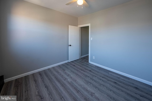 2105 S Woodstock St, Philadelphia, PA 19145 - spare room with ceiling fan, baseboards, and dark wood-style floors