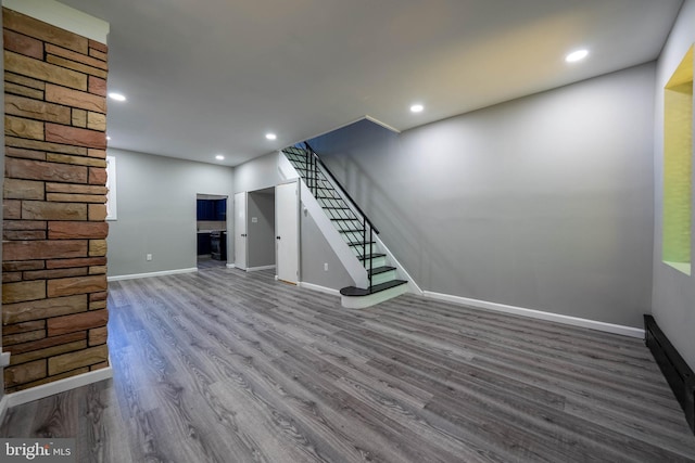 2105 S Woodstock St, Philadelphia, PA 19145 - below grade area with recessed lighting, stairway, wood finished floors, and baseboards