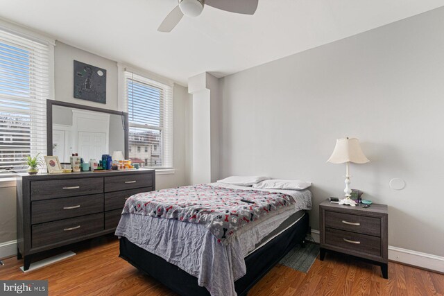 2609 Keyworth Ave, Baltimore, MD 21215 - bedroom featuring baseboards, a ceiling fan, and wood finished floors