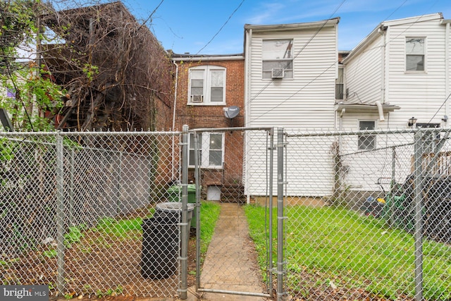 2609 Keyworth Ave, Baltimore, MD 21215 - exterior space featuring a yard, brick siding, fence private yard, and a gate