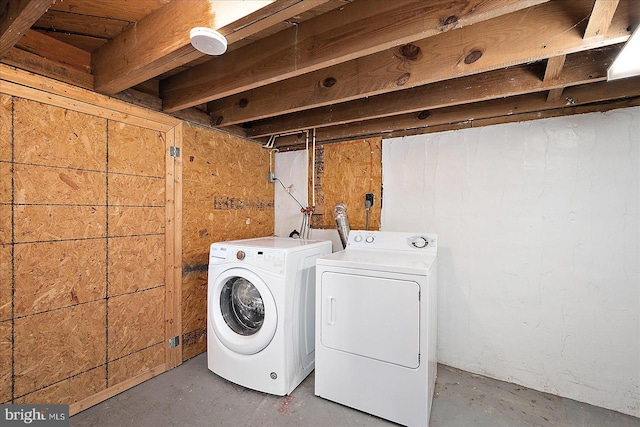 laundry area with separate washer and dryer and laundry area
