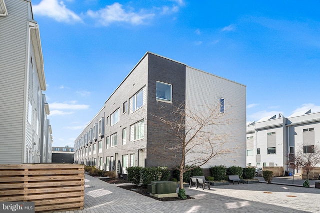 view of building exterior with a residential view