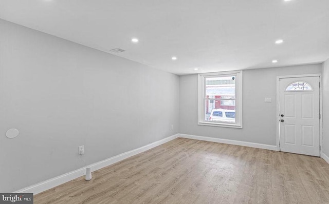 foyer with baseboards, recessed lighting, and wood finished floors