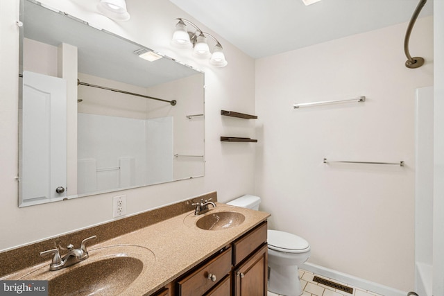 396 Delmar St, Philadelphia, PA 19128 - bathroom featuring toilet, double vanity, baseboards, a shower, and tile patterned floors