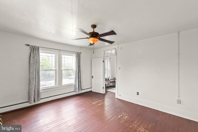 911 Martinsburg Pike, Winchester, VA 22601 - unfurnished room featuring dark wood finished floors, ceiling fan, baseboard heating, and baseboards