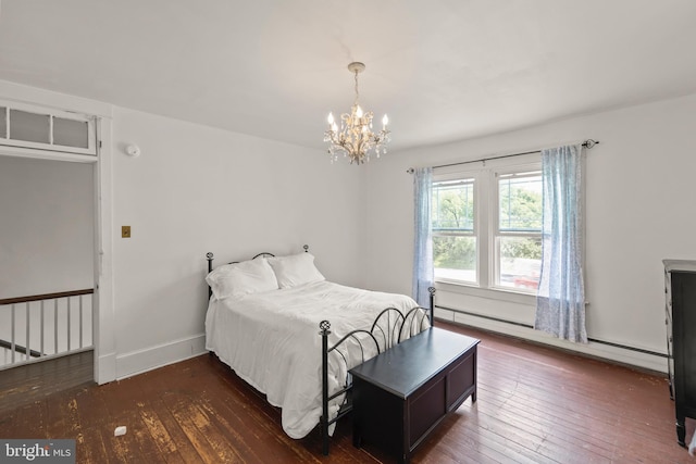 911 Martinsburg Pike, Winchester, VA 22601 - bedroom featuring a chandelier, wood-type flooring, and a baseboard heating unit