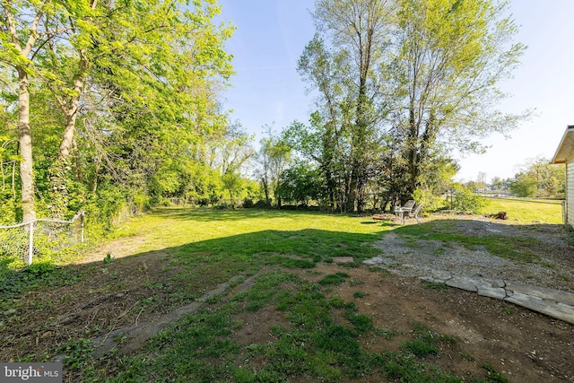 view of yard featuring fence