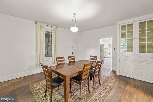 911 Martinsburg Pike, Winchester, VA 22601 - dining room with washing machine and dryer, dark wood-type flooring, and baseboards