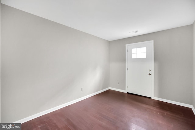 2904 11th St NW, Washington, DC 20001 - foyer with dark wood-type flooring, visible vents, and baseboards